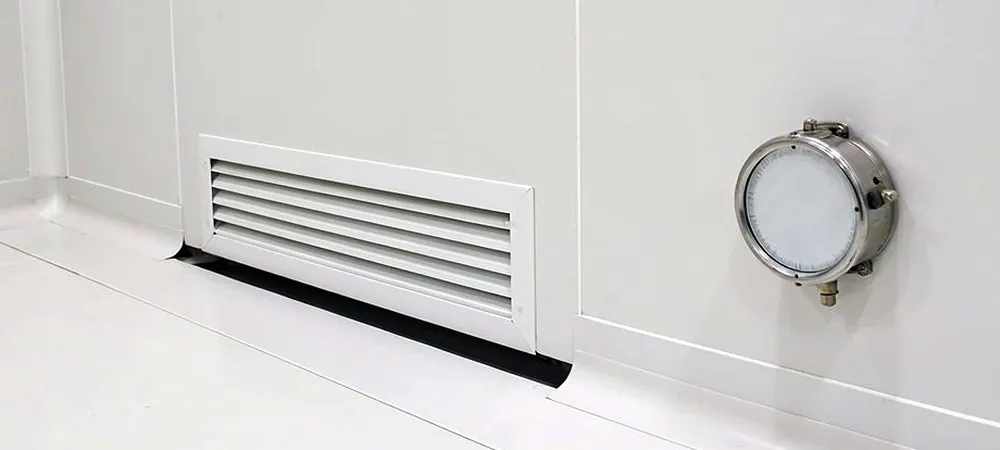 Pressure control and return-air design in a hardwall clean room Pressure control and return-air design in a hardwall clean room
