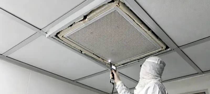 Damaged HEPA filter gasket causing a leak in a cleanroom ceiling