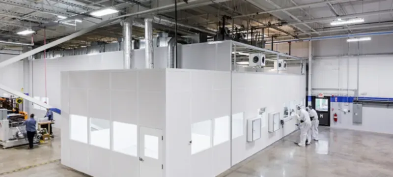 New bay of rigid panels added to an existing hardwall clean room during expansion