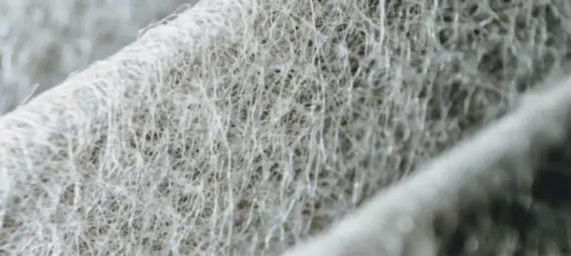 Close-up of traditional fiberglass HEPA filter media Close-up of traditional fiberglass HEPA filter media