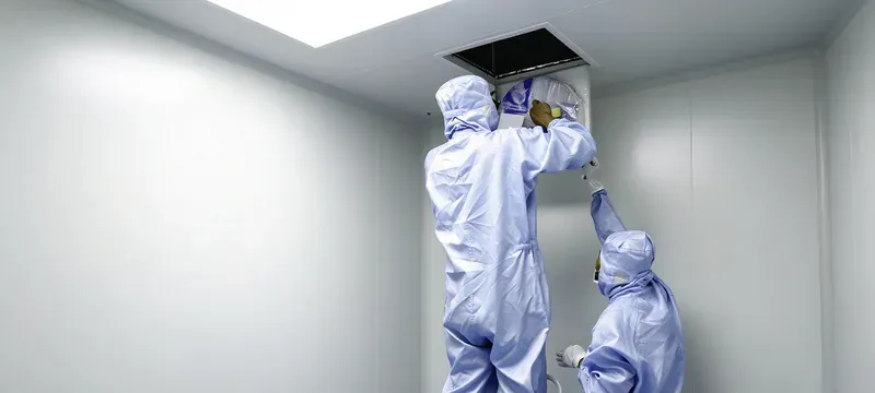 Technician performing HEPA filter integrity leak test Technician performing HEPA filter integrity leak test