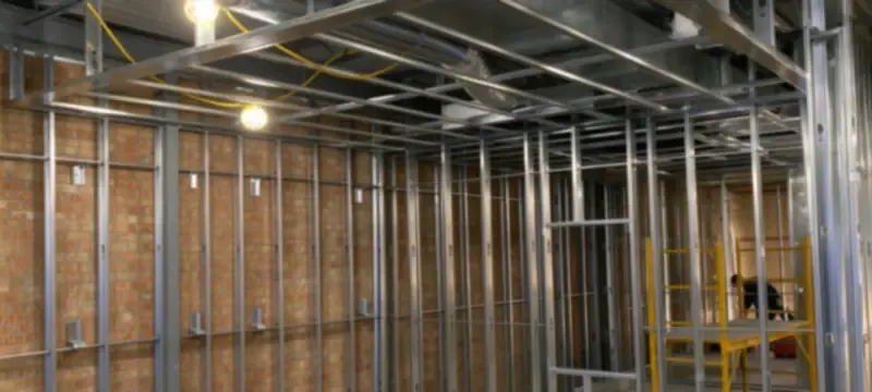 Cleanroom panel installation sequence workers Cleanroom panel installation sequence workers