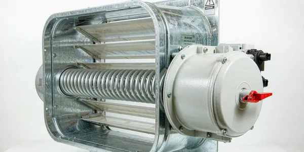 Spring-loaded motorized backdraft damper with actuator Spring-loaded motorized backdraft damper with actuator